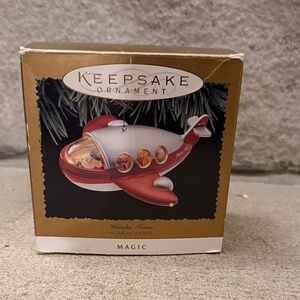 1995 Hallmark MAGIC Blinking Lights Keepsake Ornament Santa's Plane Headin’ Home